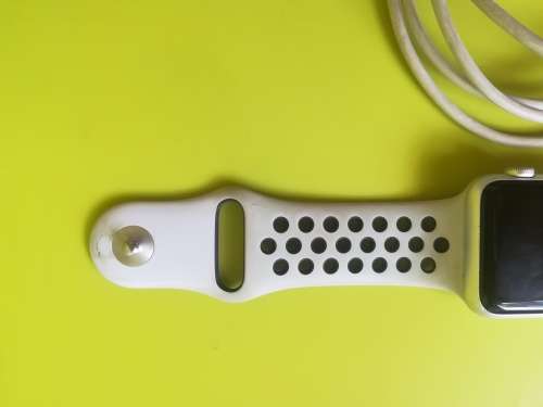 Advanced Series 1 Apple Watch (with white/grey nike strap and charger)