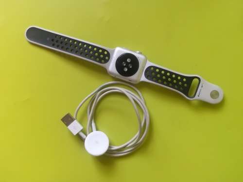 Advanced Series 1 Apple Watch (with white/grey nike strap and charger)