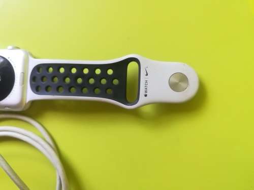 Advanced Series 1 Apple Watch (with white/grey nike strap and charger)