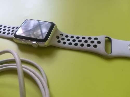 Advanced Series 1 Apple Watch (with white/grey nike strap and charger)
