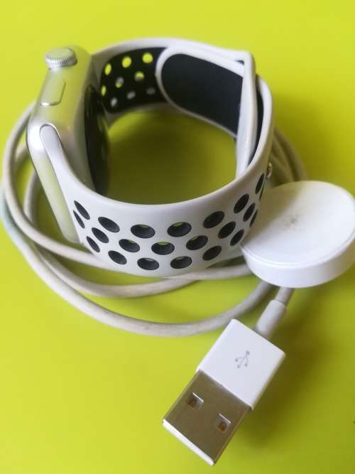 Advanced Series 1 Apple Watch (with white/grey nike strap and charger)