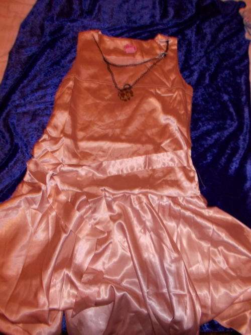satin like dress new but needs to be steamed been in storage medium