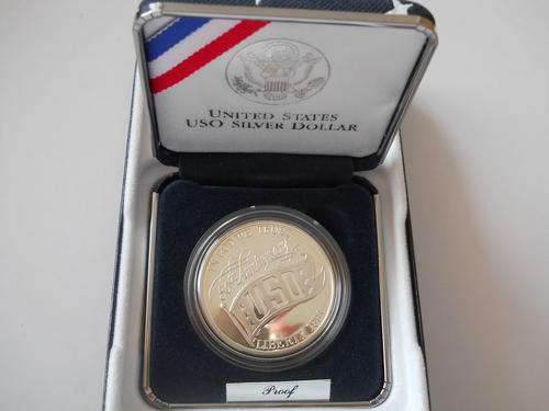 AMERICAN USO SILVER COMMEMORATIVE DOLLAR WITH COA. U.S MINT LEGAL TENDER. 26.73GRAMS - 90% SILVER