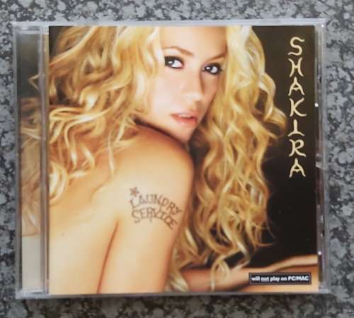 SHAKIRA - "LAUNDRY SERVICE"  CD -  in GOOD CONDITION