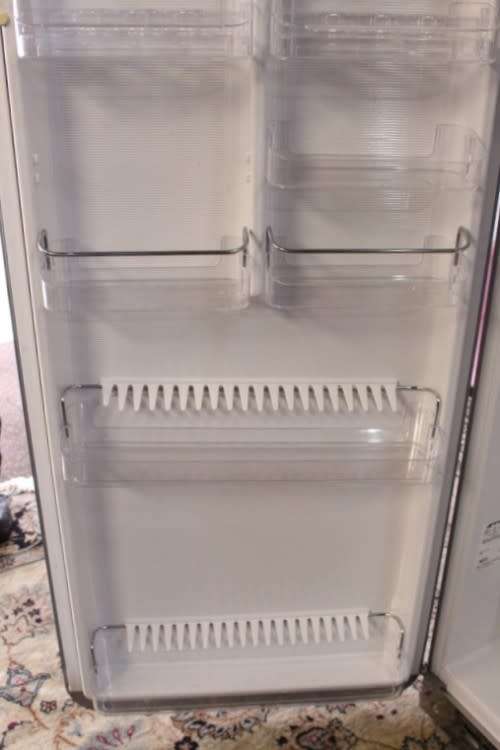 A silver original Smeg (model FAB30S7) "50's Retro Style Aesthetic" fridge-freezer combo