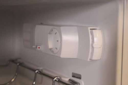 A silver original Smeg (model FAB30S7) "50's Retro Style Aesthetic" fridge-freezer combo