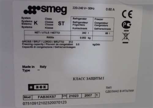 A silver original Smeg (model FAB30S7) "50's Retro Style Aesthetic" fridge-freezer combo