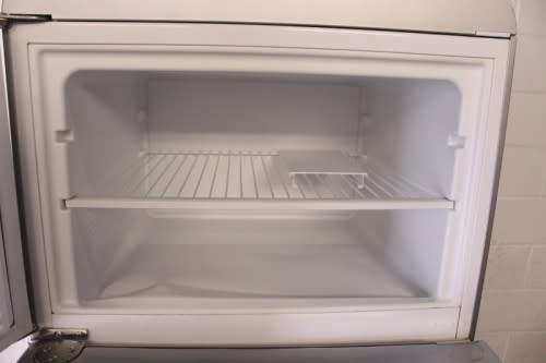 A silver original Smeg (model FAB30S7) "50's Retro Style Aesthetic" fridge-freezer combo