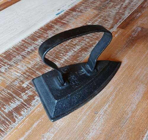 Antique cast iron clothes iron