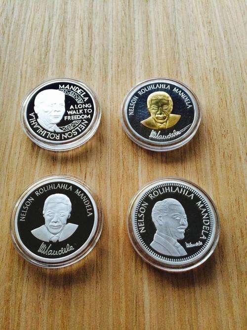 SILVER CLADDED NELSON MANDELA MEDALLIONS - ONE BID FOR ALL 4 MEDALLIONS