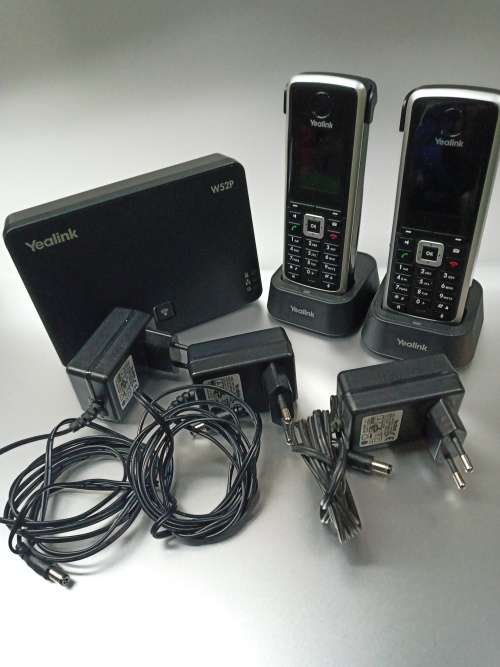 Cordless phone Yealink W52P IP DECT (Includes Base and two Handsets) used, please read description.