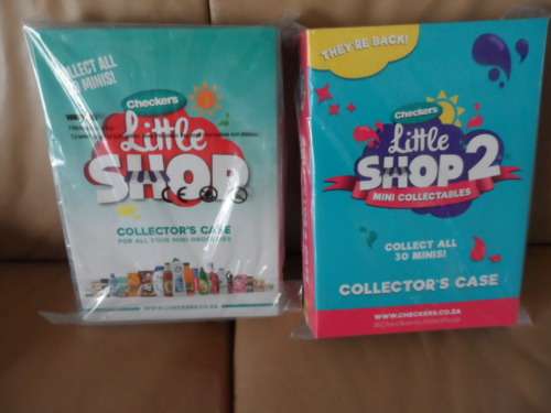 Checkers little shop 1 and 2 in the folders- full set. one bid for both sets