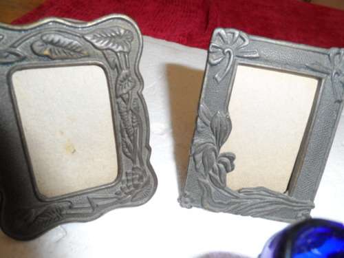 Vintage blue eye glass old miniature cooldrink bottle and miniature pewter like frames self standing