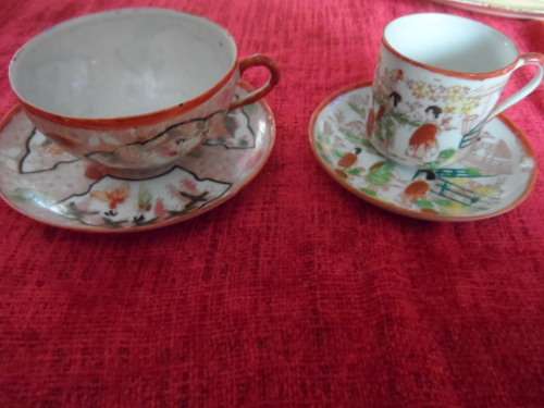 Two beautiful cups and saucers  very thin china made in japan