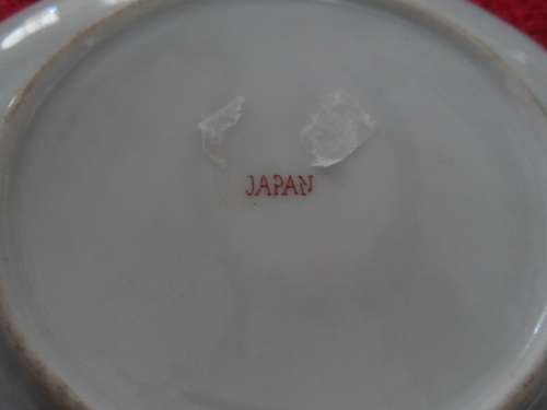 Two beautiful cups and saucers  very thin china made in japan