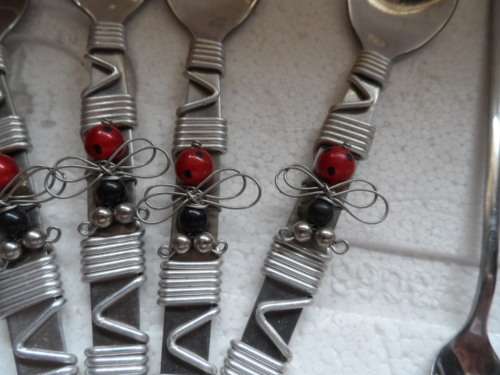 Lot of mixed cutlery almost new the ladybird one has 6 not 5 as in picture