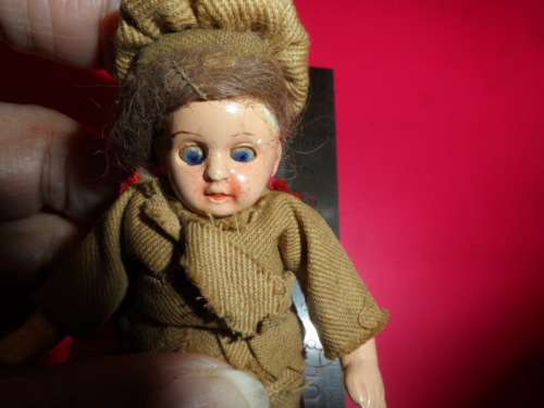 Very rare find German Kestner Military girl moving eyes all original. 9cm. no chips