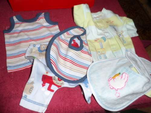 Some dolls/baby clothes