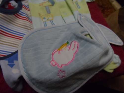 Some dolls/baby clothes