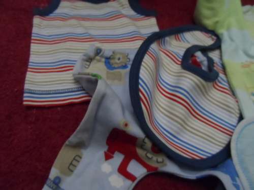 Some dolls/baby clothes