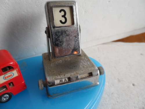 VINTAGE DESK CALINDER WITH MATCHBOX BUS.