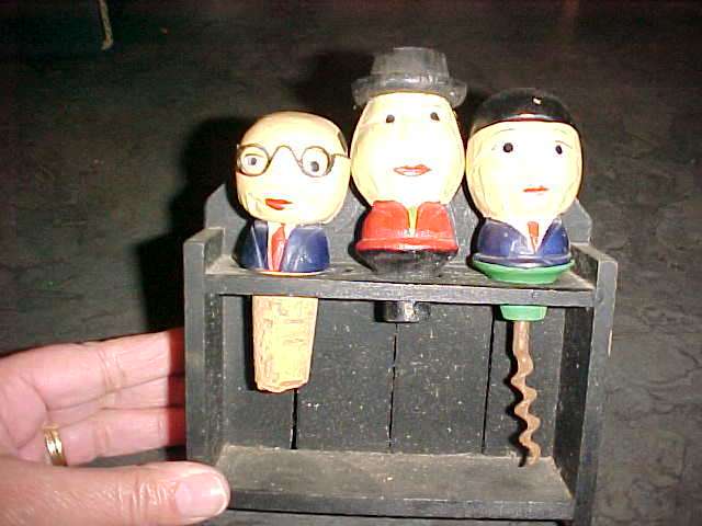 VERY OLD NOVELTY OPENER SET WITH  NOTE THE ONE OPENER MISSING.MADE OUT OF WOOD.
