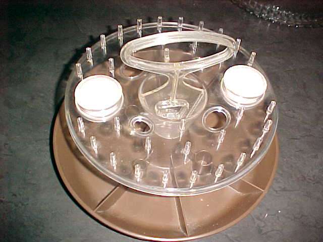 VINTAGE SEWING CADDY ON TURNTABLE