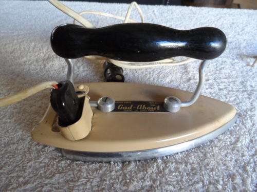 Vintage electric fold up iron