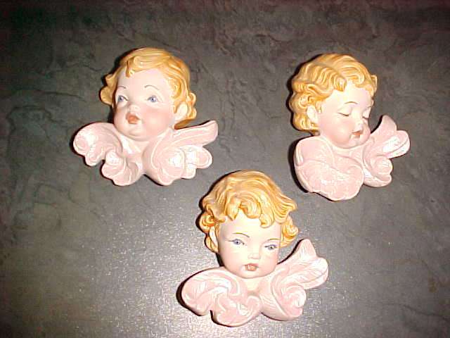 Three little angel faces