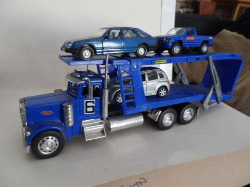 PETERBILT CAR TRANSPORTER AND TWO VEHICLES  [A8]