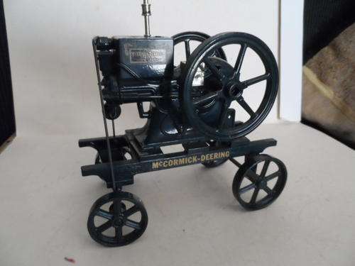 MCCORMIC DEERING  TRACTOR, METAL WHEELS,  DIECAST MODEL 1/18?