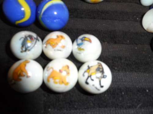 Huge Marble collection Ironies and glass and lion king small to large .  lovely collection