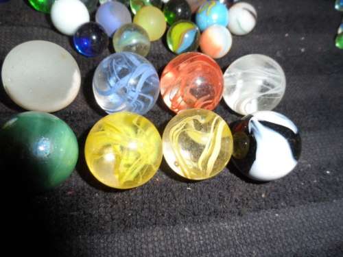 Huge Marble collection Ironies and glass and lion king small to large .  lovely collection