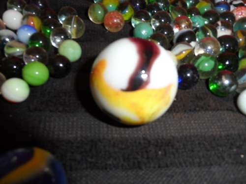 Huge Marble collection Ironies and glass and lion king small to large .  lovely collection