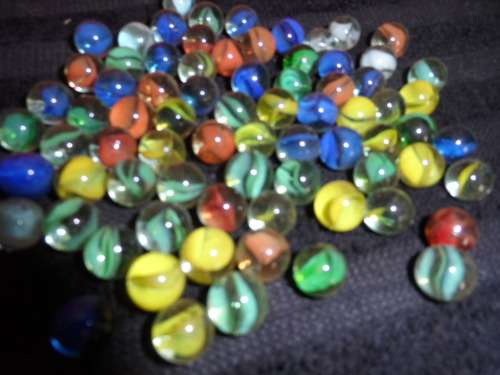 Huge Marble collection Ironies and glass and lion king small to large .  lovely collection