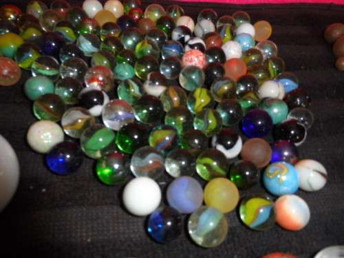Huge Marble collection Ironies and glass and lion king small to large .  lovely collection