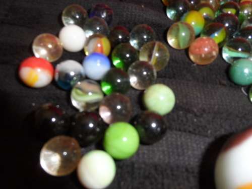 Huge Marble collection Ironies and glass and lion king small to large .  lovely collection