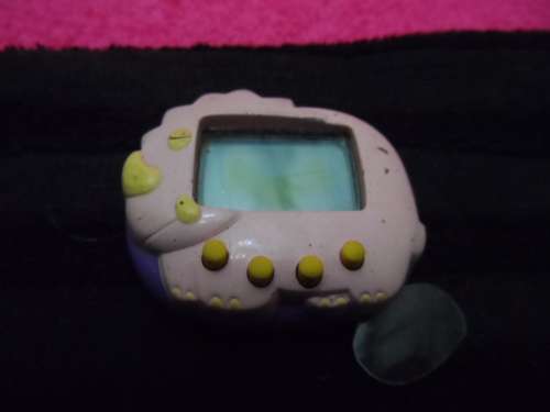 Vintage Tamagochi untested no batteries with original tab on/off