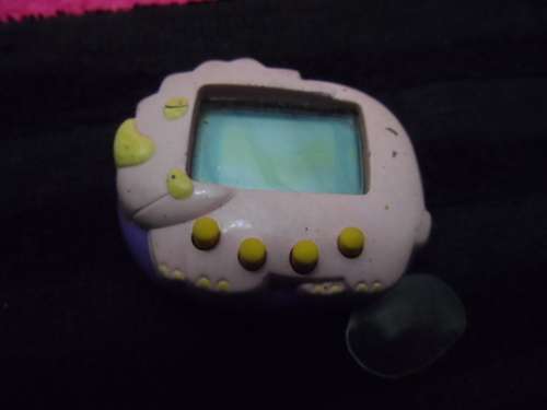 Vintage Tamagochi untested no batteries with original tab on/off