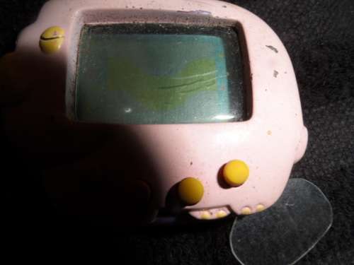 Vintage Tamagochi untested no batteries with original tab on/off
