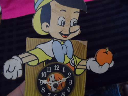 Very cute unusual Vintage wooden pinocchio clock unchecked
