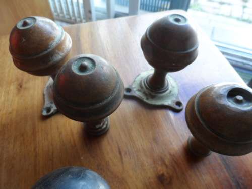 Awesome find of vintage solid brass door knobs 2 complete pairs  plus one beautiful wooden one only