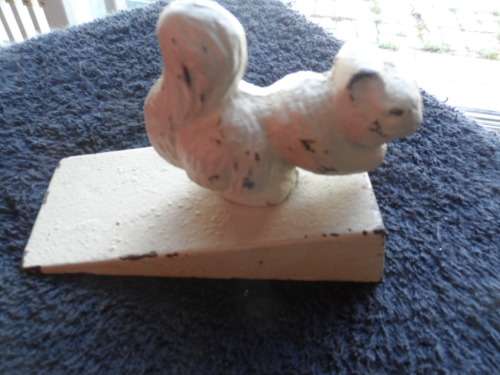The cutest cast iron squirrel door stop painted