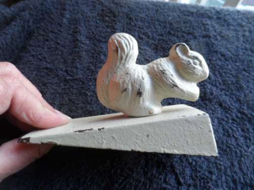 The cutest cast iron squirrel door stop painted