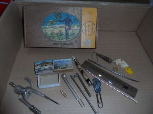 Vingage cigar box made in holland with various old instruments etc.