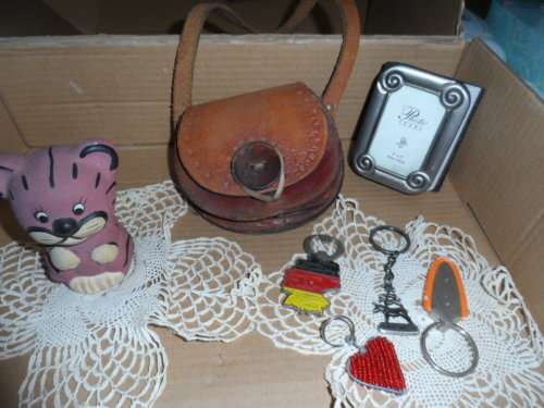 Variety of items from leather bag to beautiful little photo book with silver front