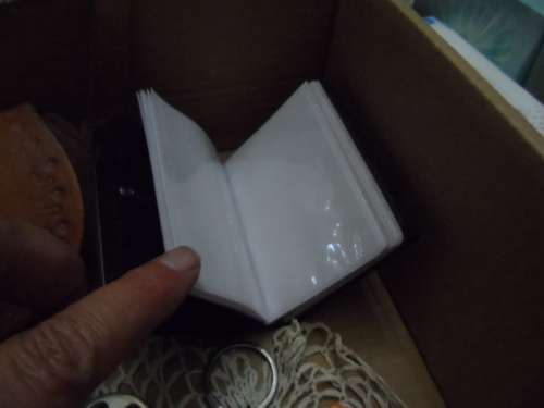 Variety of items from leather bag to beautiful little photo book with silver front
