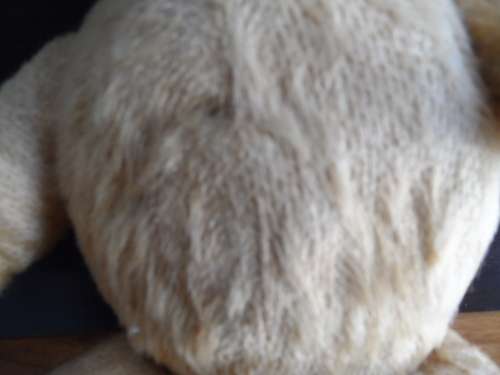 Very old mohair Ark teddy Head is straw filled has lost one eye about 33cm