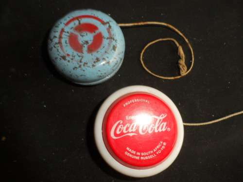 Vintage coke professional and tinplate yoyo