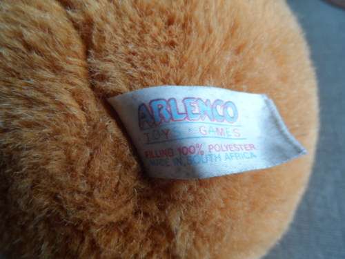 Large Arlenco dog soft toy played with